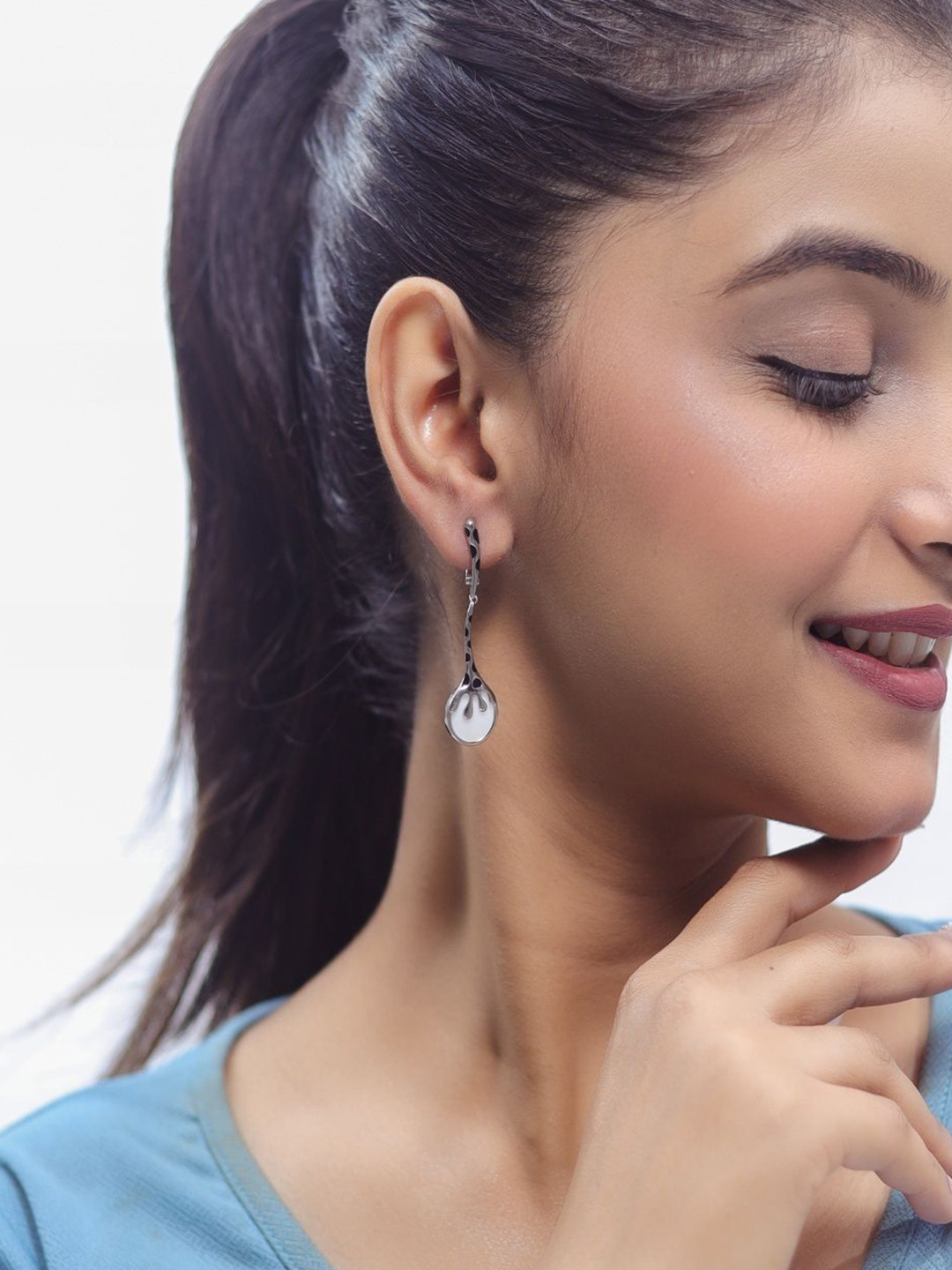 TASSYA Silver-Plated Artificial Stones Studded Splash Shaped Drop Earrings