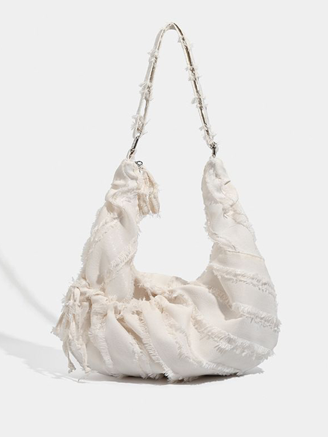 CORSICA Women Textured Bucket Fringed Shoulder Bag