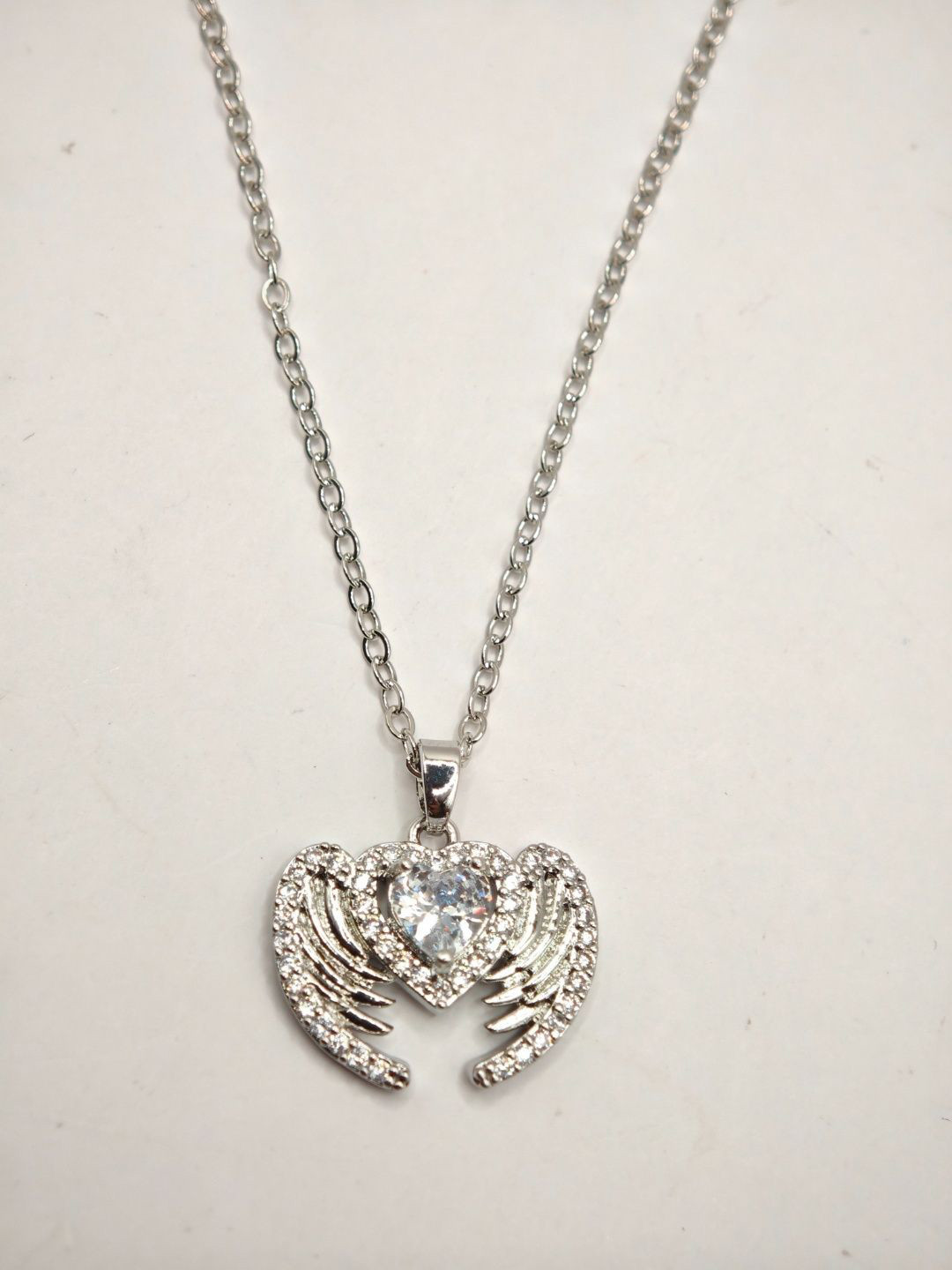 SAPRAA TRENDS Rhodium-Plated American Diamond Studded Angel Wings Heart Pendant With Chain