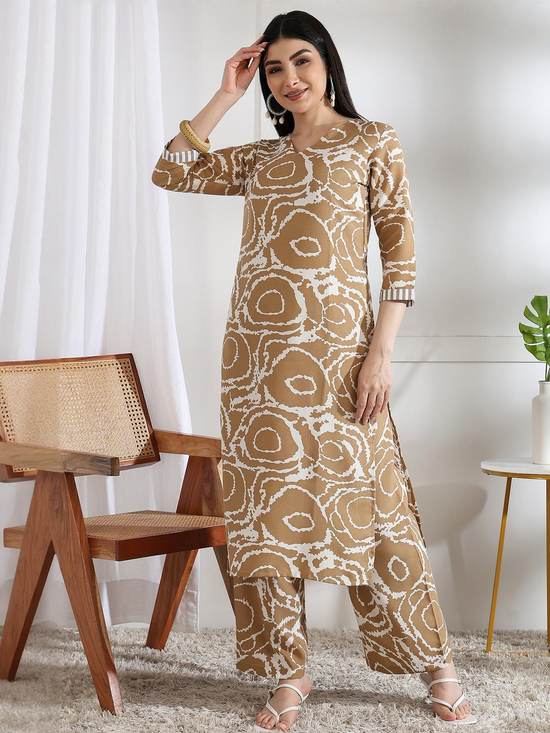 Moda Rapido Women Gold Viscose Rayon Kurta Sets