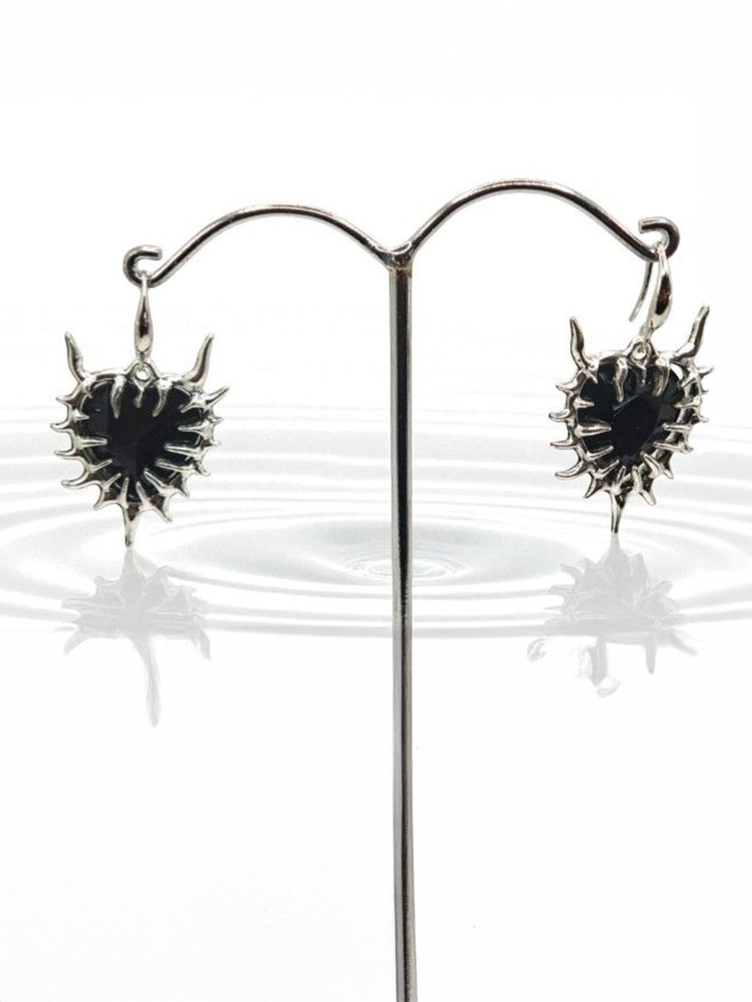 SAPRAA TRENDS Stainless Steel Silver-Plated Stone Studded Devil Heart Shaped Drop Earrings