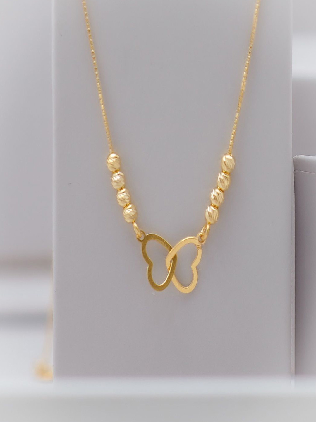 TASSYA Gold-Plated Artificial Beaded Heart Shaped Interlocked Minimal Neckalce