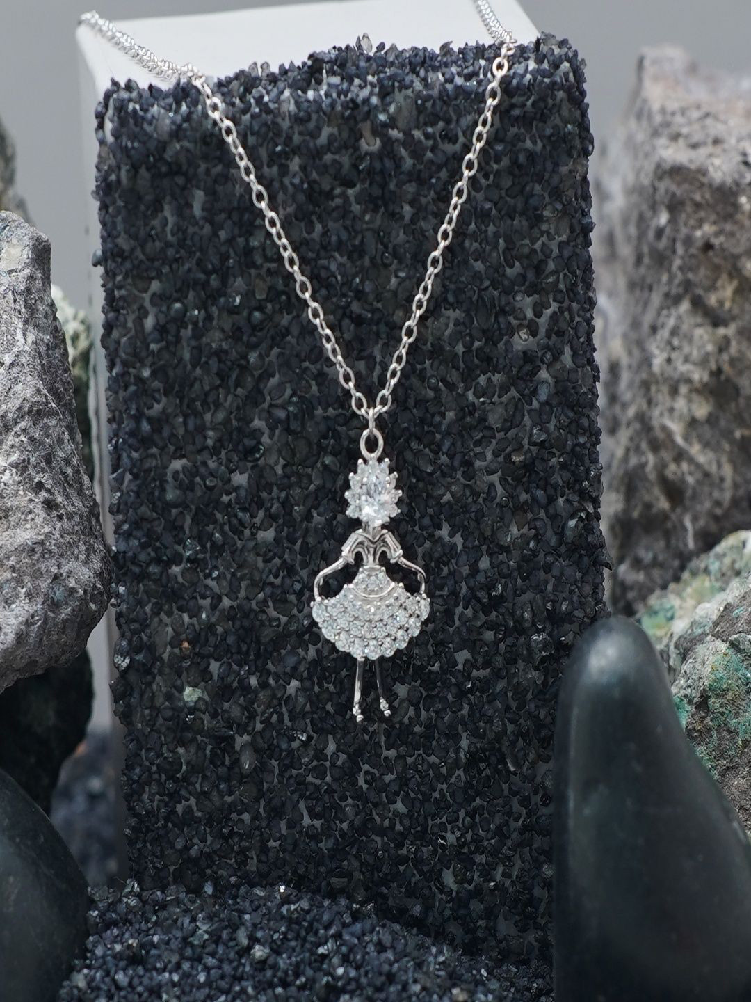 TASSYA Women Silver-Plated Artificial Stones Studded Ballerina Shaped Pendant With Chain