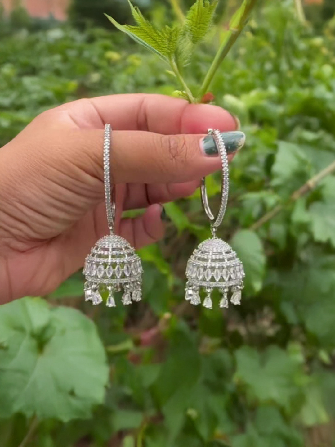 NEW AMBAJI ART JEWELLERY Silver Rhodium-Plated AD Studded Dome Shaped Jhumkas