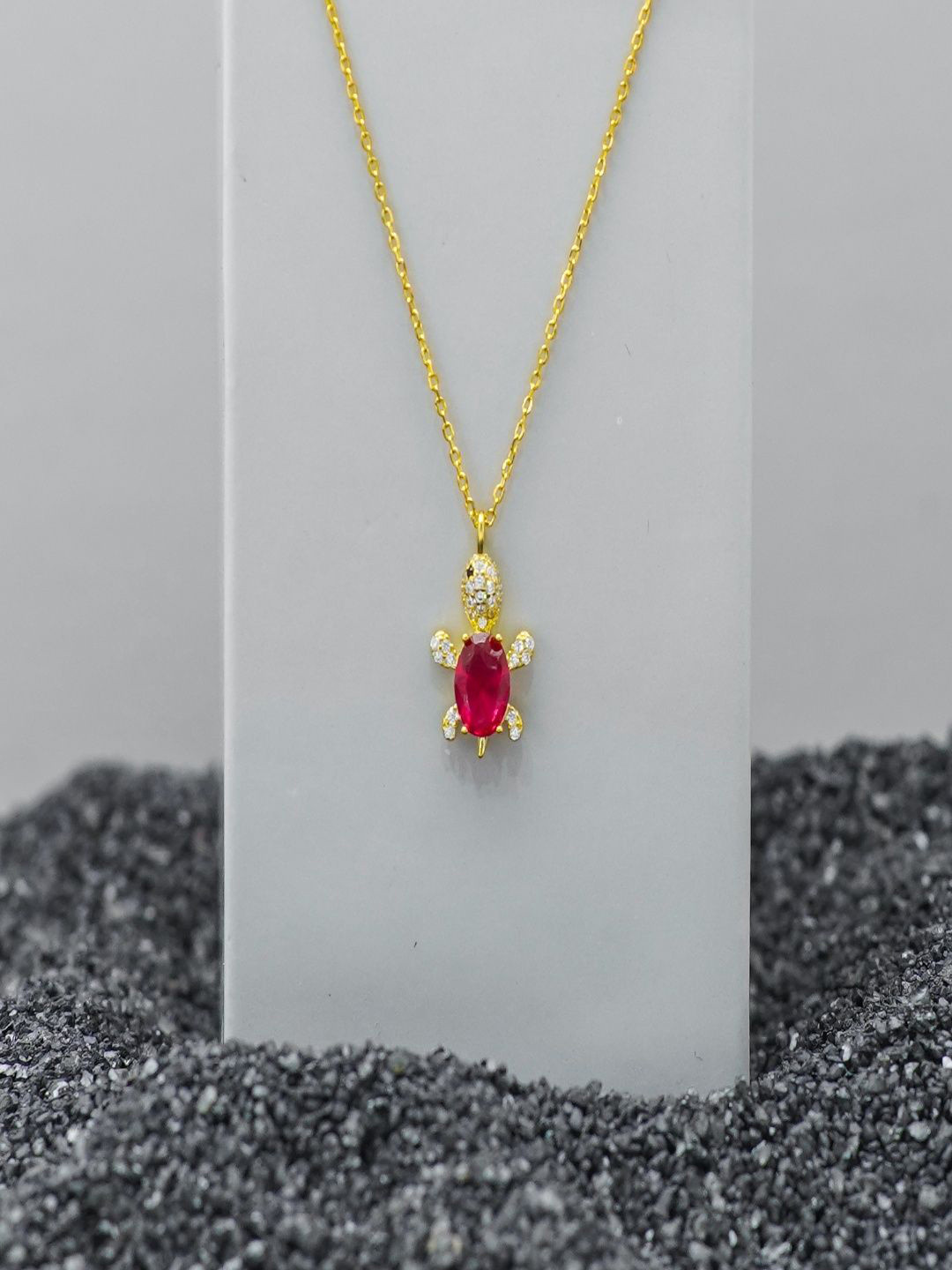 TASSYA Silver Plated Ruby Studded Turtle Shaped Pendant With Chain