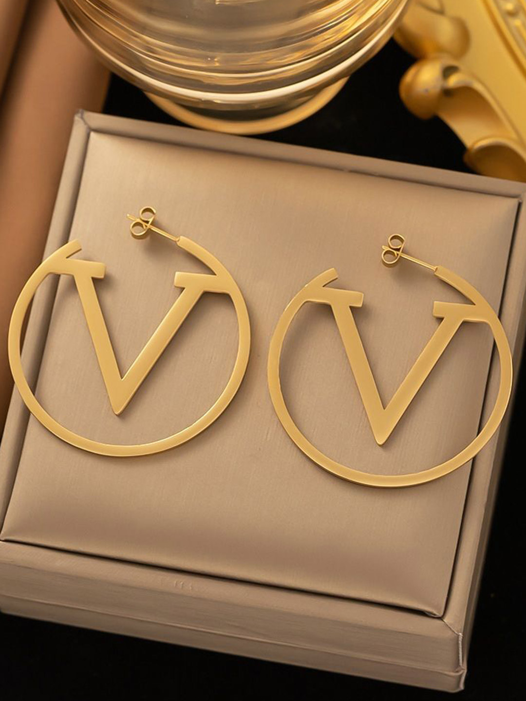 Jewelfy Stainless Steel Gold-Plated Circular Shaped Half Hoop Earrings