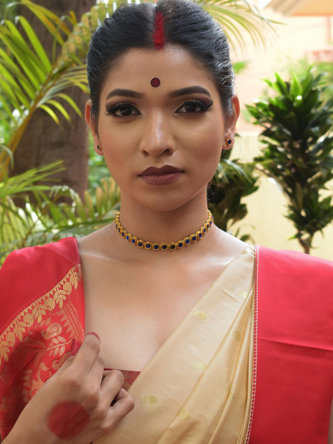 Aarika Brass Gold-Plated Artificial Stones Studded Statement Choker  Necklace