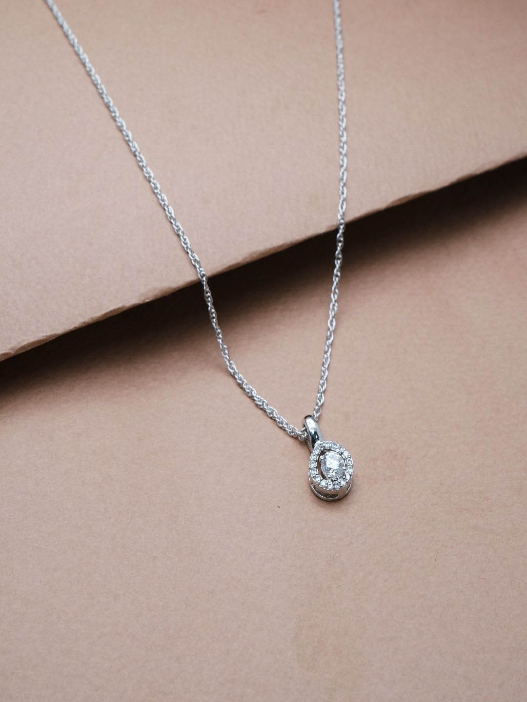 TASSYA Silver-Plated Stones Studded Double Halo Teardrop Shaped Pendant With Chain