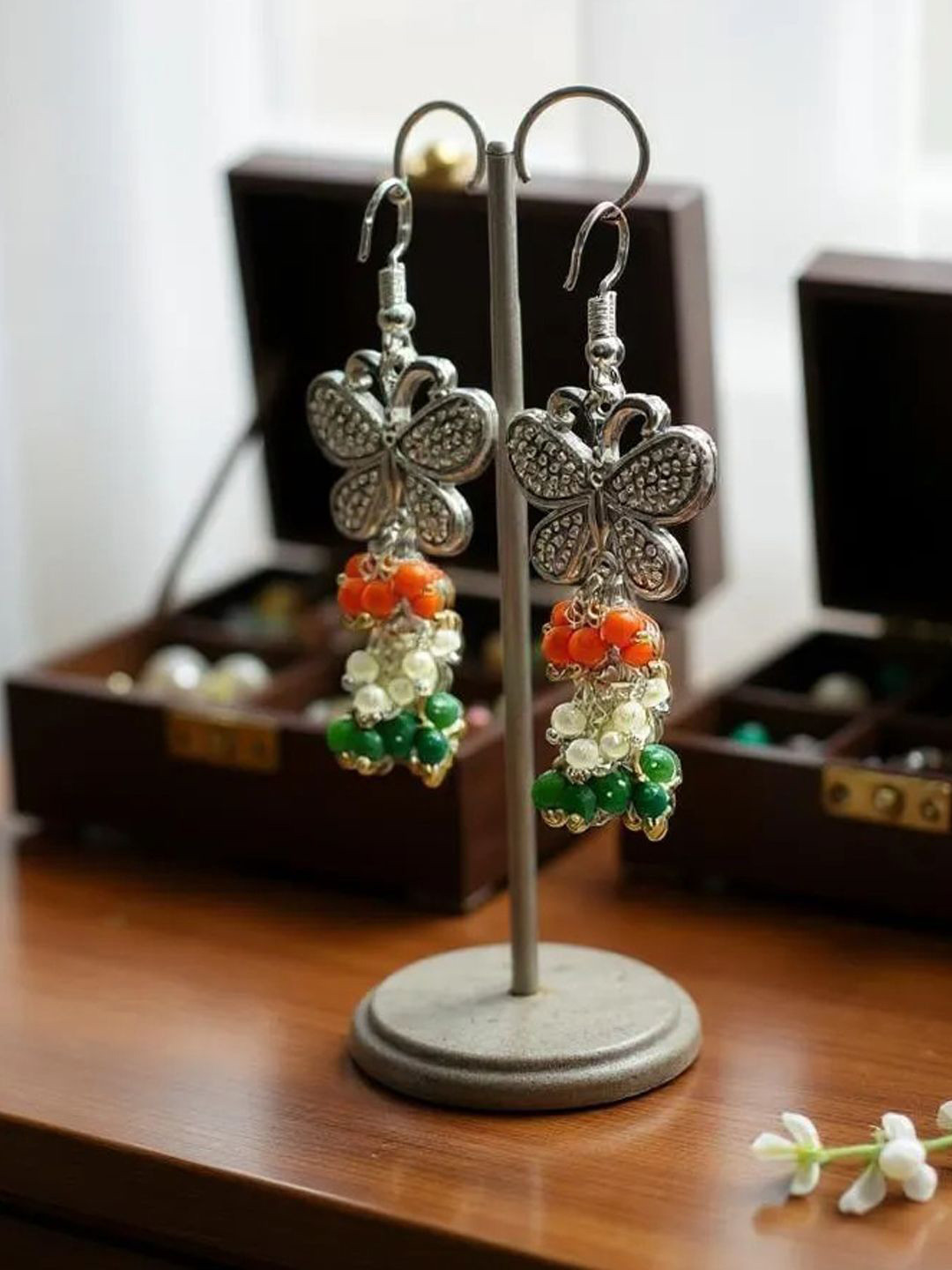 The Style Courtyard Artificial Beaded Oxidised Butterfly Shaped Drop Earrings