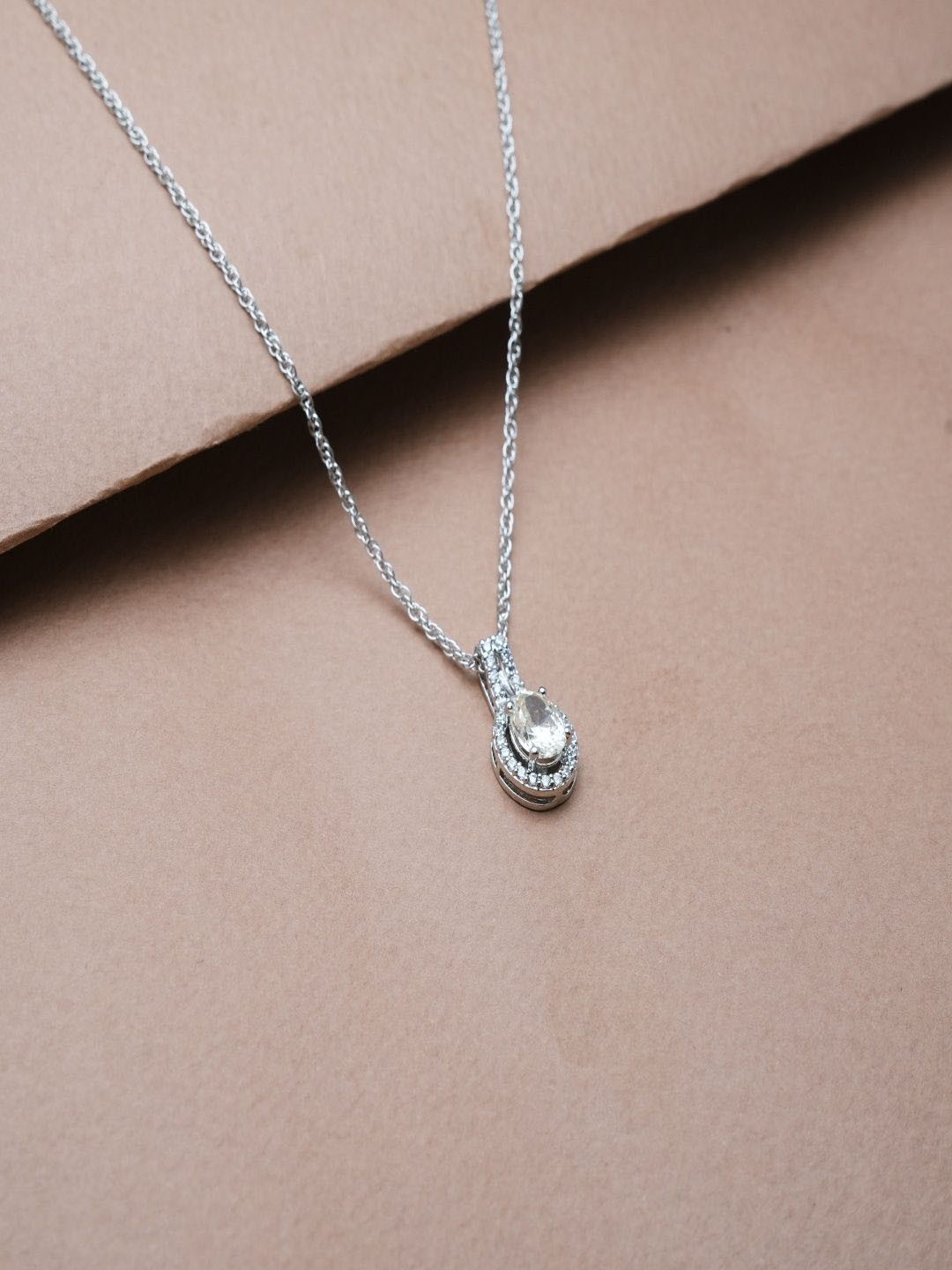 TASSYA Silver-Plated Stones Studded Double Halo Teardrop Shaped Pendant With Chain