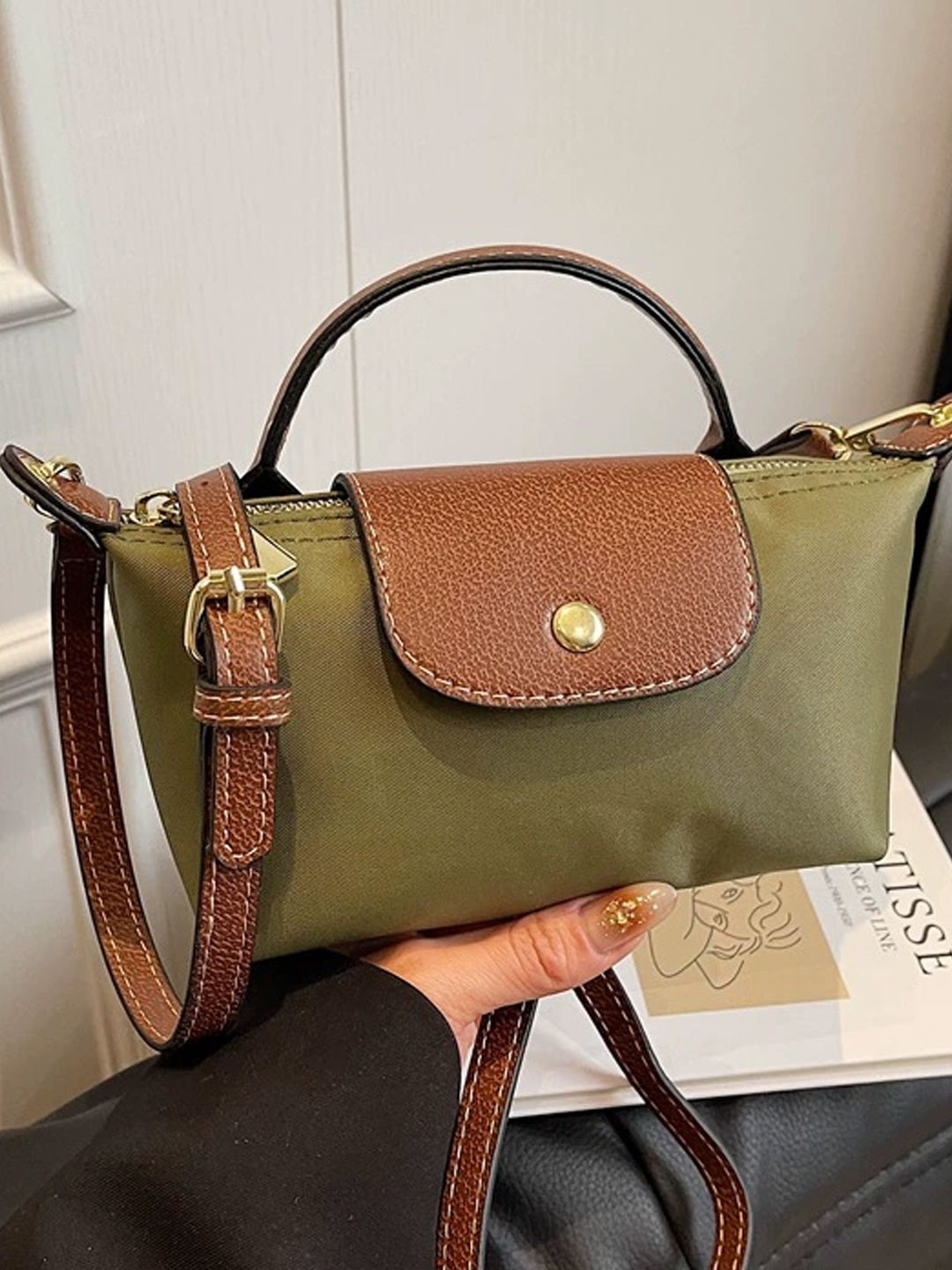 StyleCast Animal PU Bucket Sling Bag with Cut Work