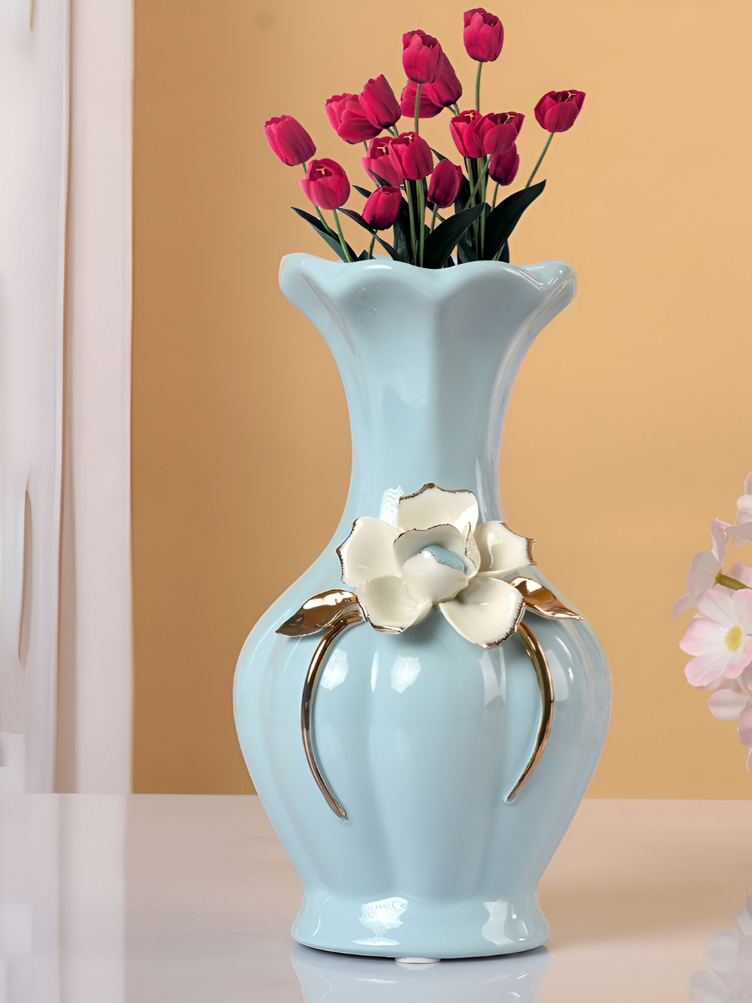 Myntra Elegant Homes Blue & White Flower Design Textured Ceramic Vase