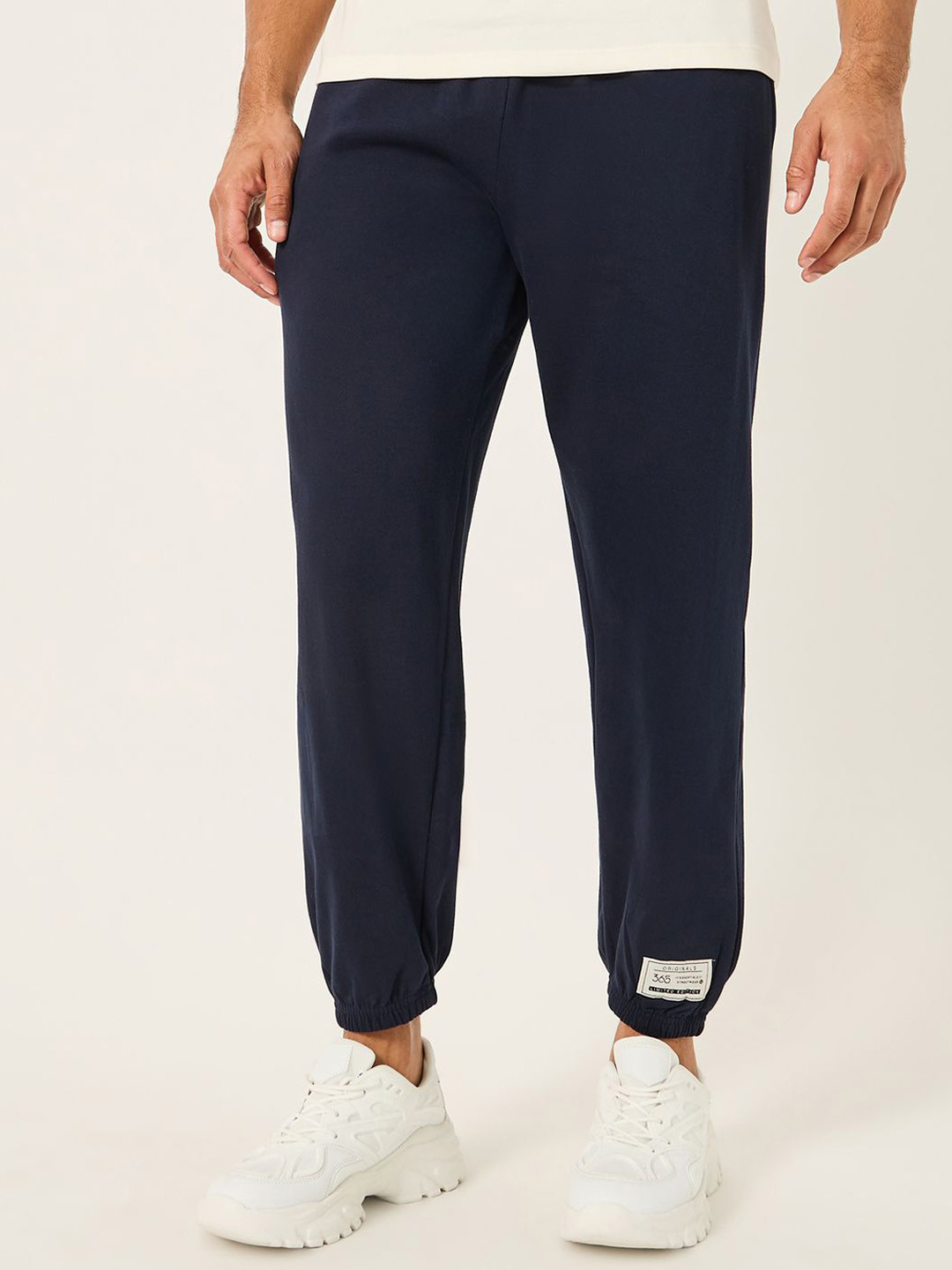 Styli Men Relaxed Fit Cotton Jogger with Badge and Zipper pockets