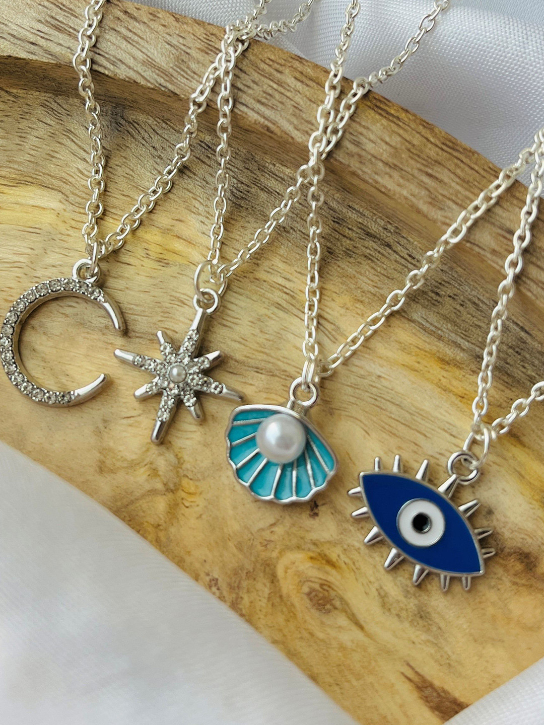 Jewelsbysirani Korean Set Of 4 Silver-Plated Artificial Stones Studded and Beaded Pendants