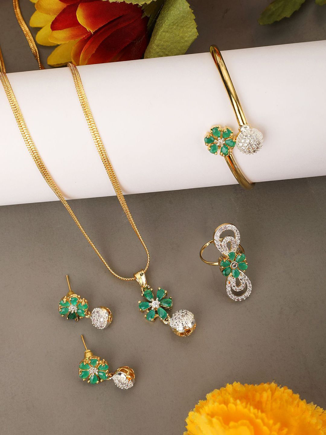 Anouk Gold Plated American Diamond Studded Pendant Earrings Bracelet and Ring