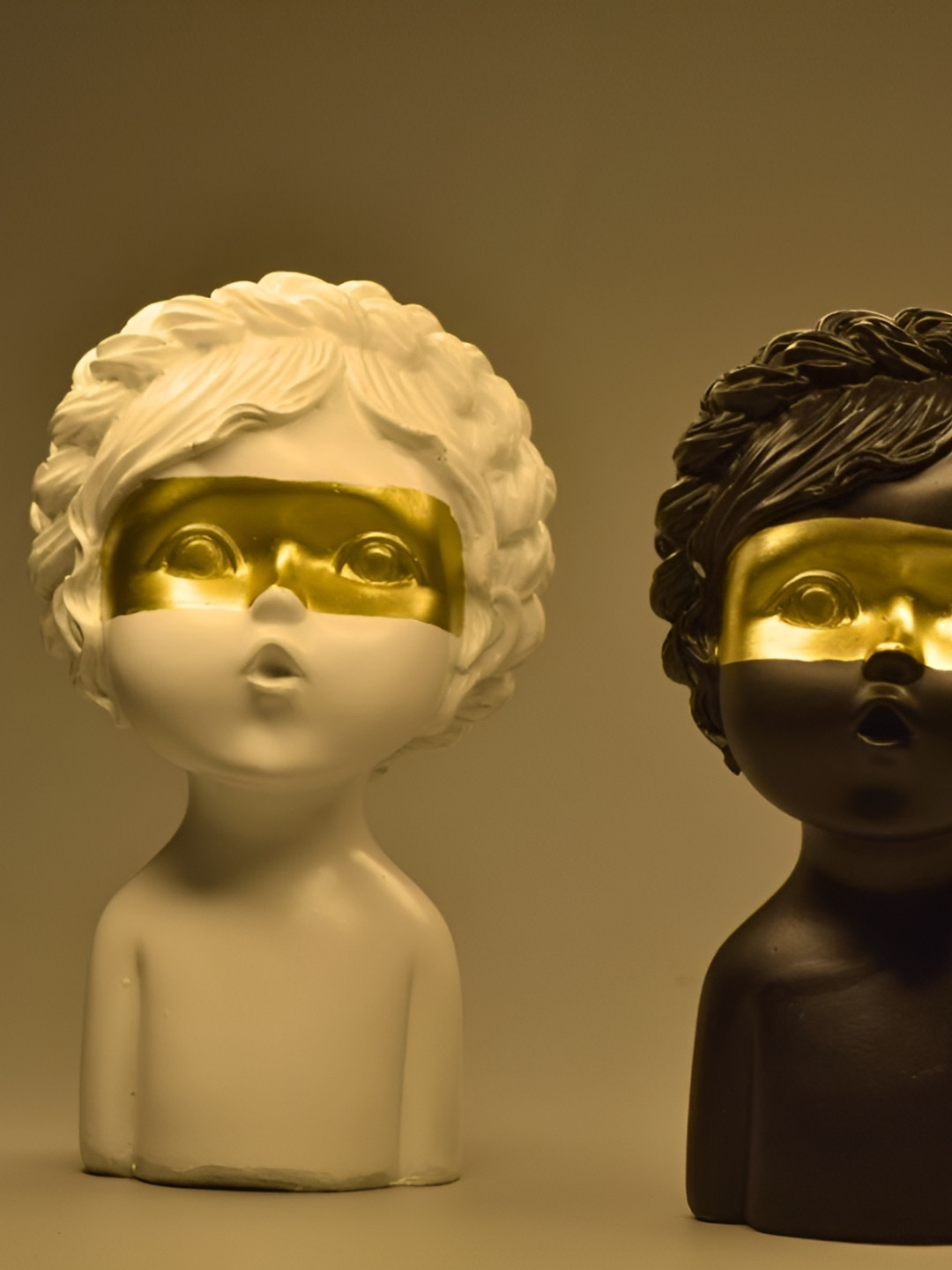 The Gharnish Golden Eye Baby Black Polyresin Metallic Living Room Medium Showpiece - 8 Inches