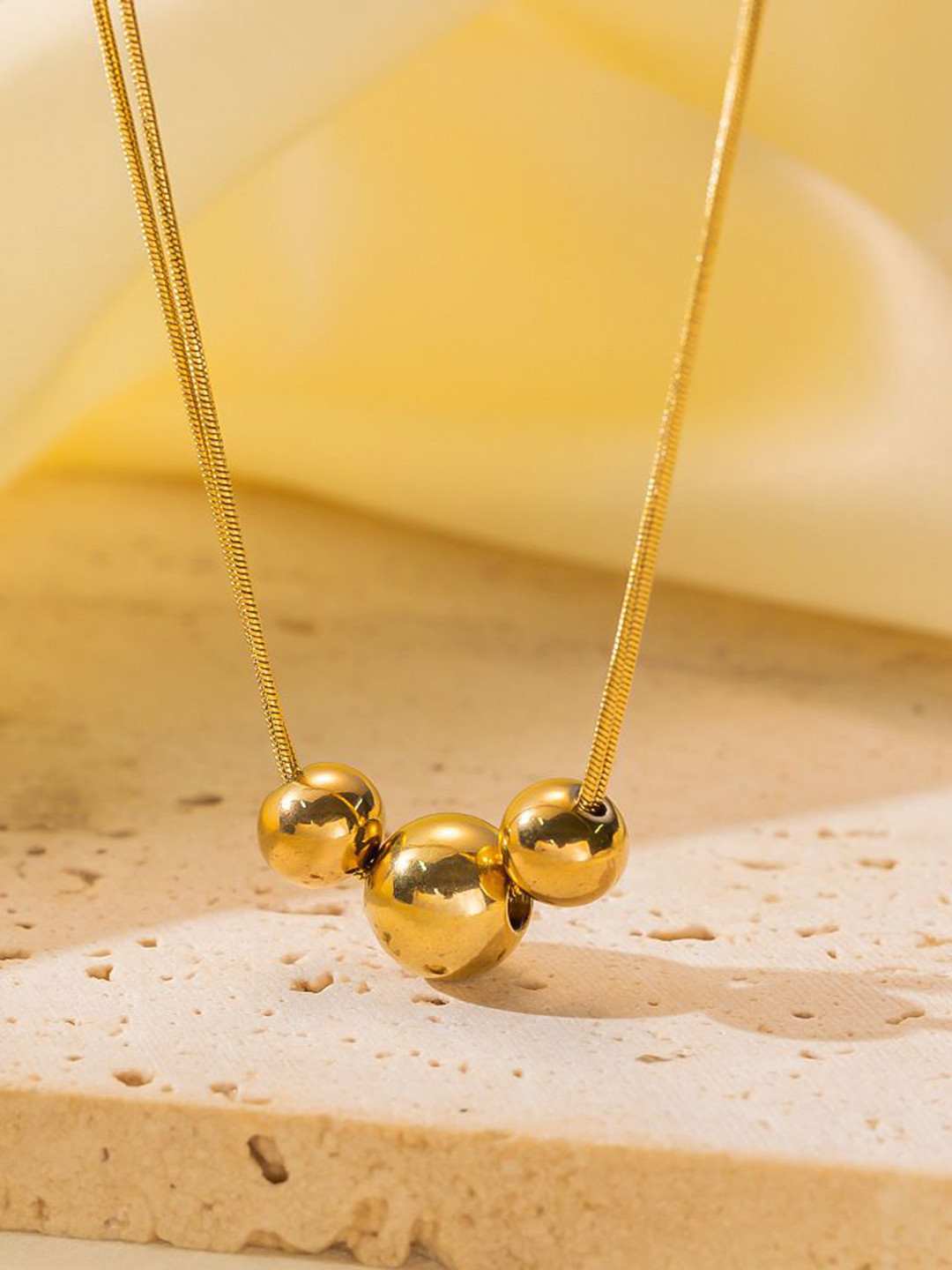 DIVASTRI Stainless Steel Gold-Plated Ball Anti Tarnish Pendant With Chain