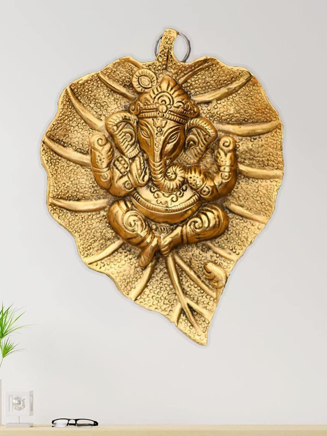 CRAFTAM Gold-Toned and Black Lord Ganesha on Leaf  Metal Religious Idol Showpiece