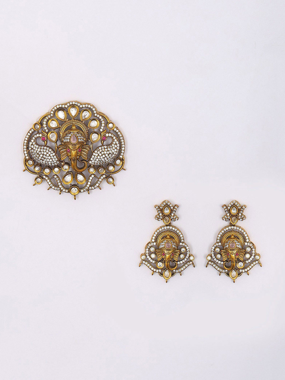 Exotic India Lord Ganesha Face Pendant & Earrings Set with Studded Stones