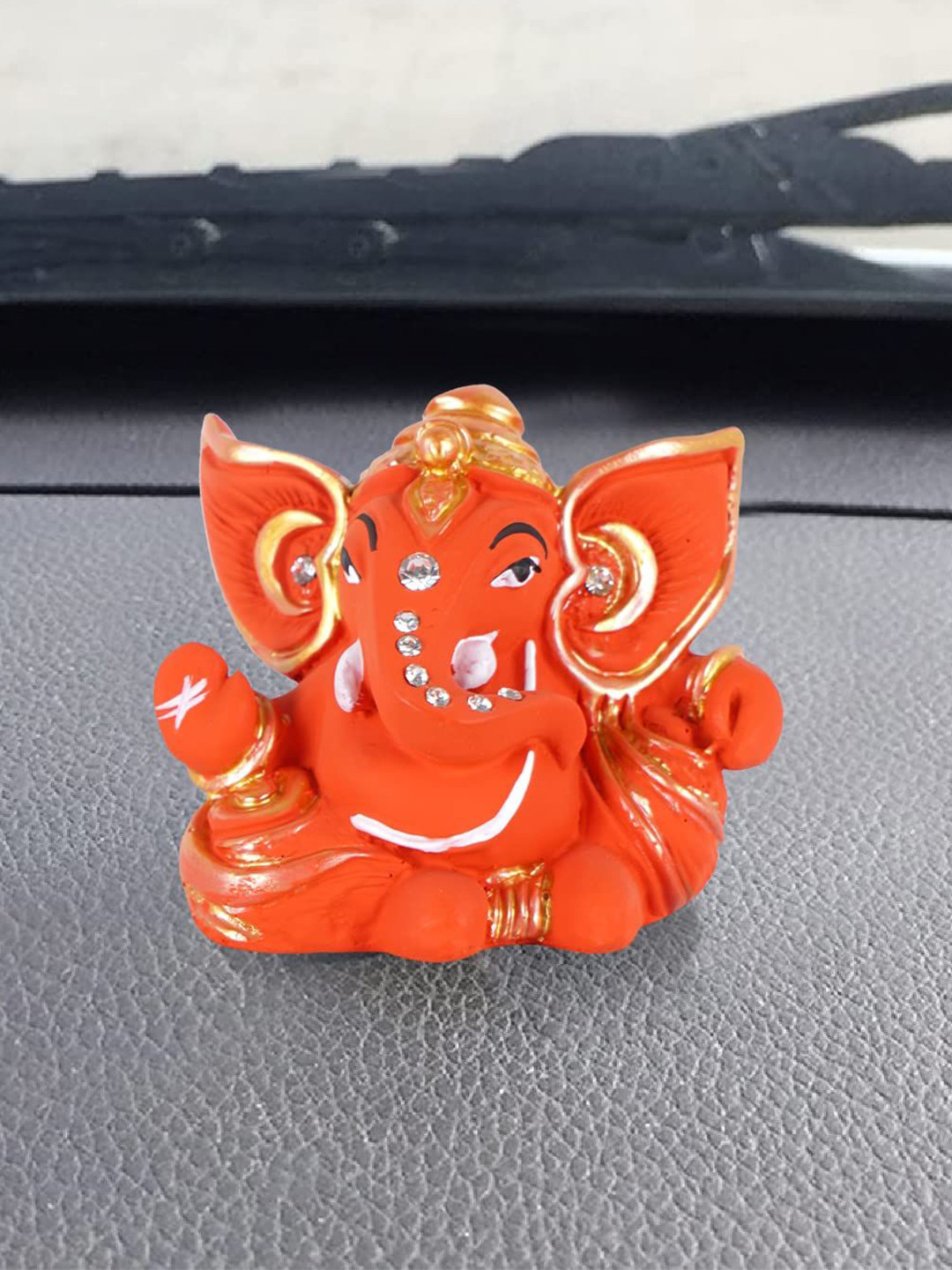 CRAFTAM Orange and Gold-Toned Ganesha Religious Idol Showpiece