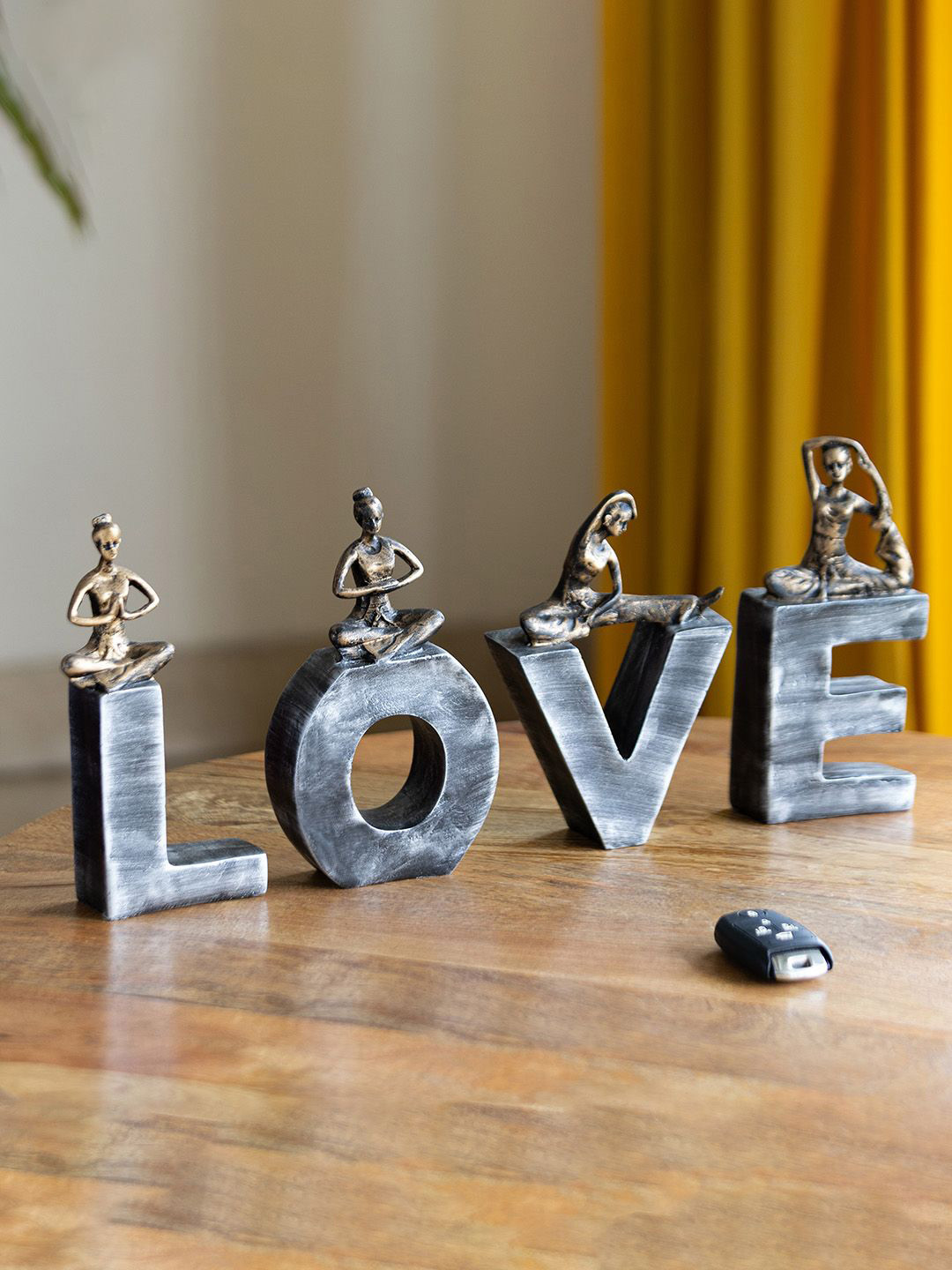 ExclusiveLane Yoga Love Gold Polyresin Natural Living Room Hand-Crafted Set of 4 Medium Showpieces - 8.1 Inches