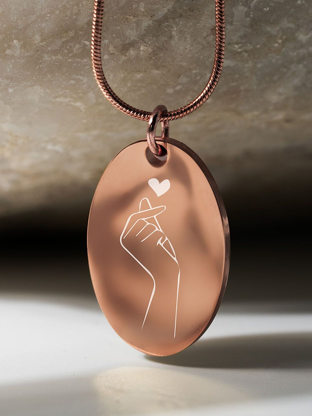 Mesmerize Rose Gold-Plated Korean Finger Hearts Oval Pendant With Chain