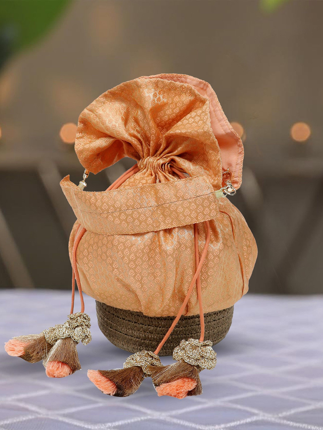 ARIYA Woven Design Tassels Wrist Loop Potli Clutch