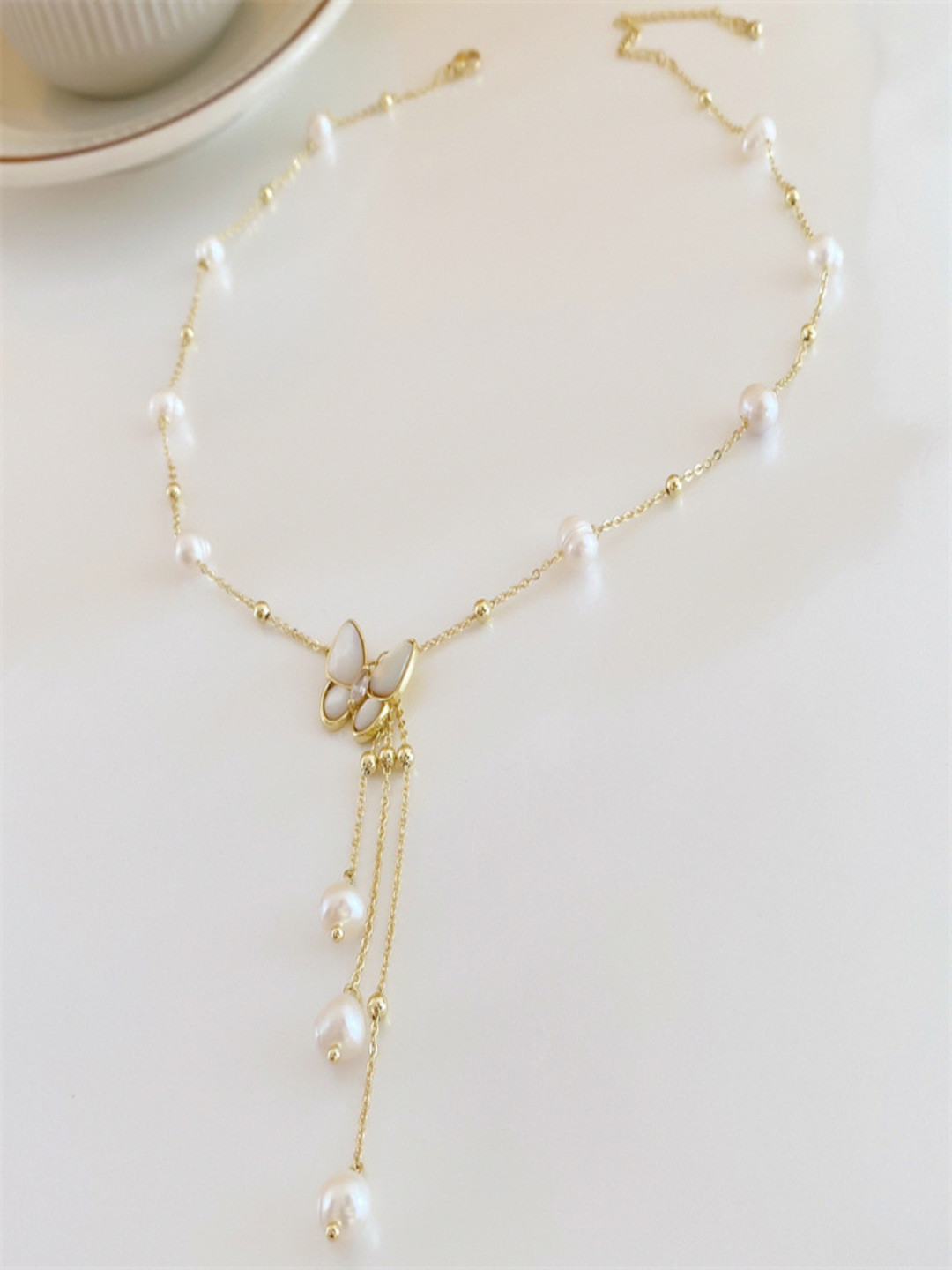 DressBerry Women Pearl Studded Butterfly Necklace