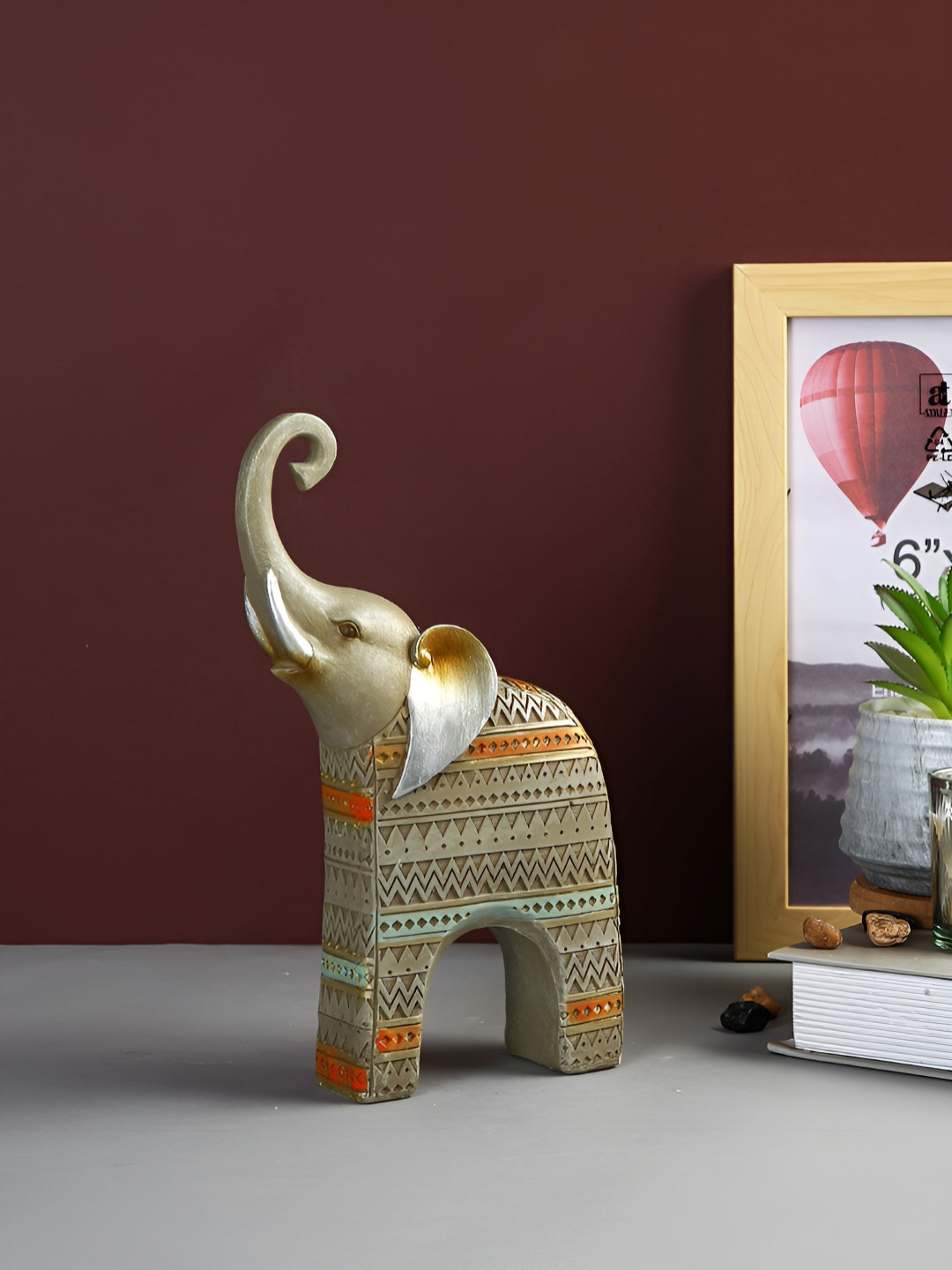 Myntra Elegant Homes Elephant with Tribal Pattern Grey Ceramic Matte Garden Medium Showpiece - 9.1 Inches