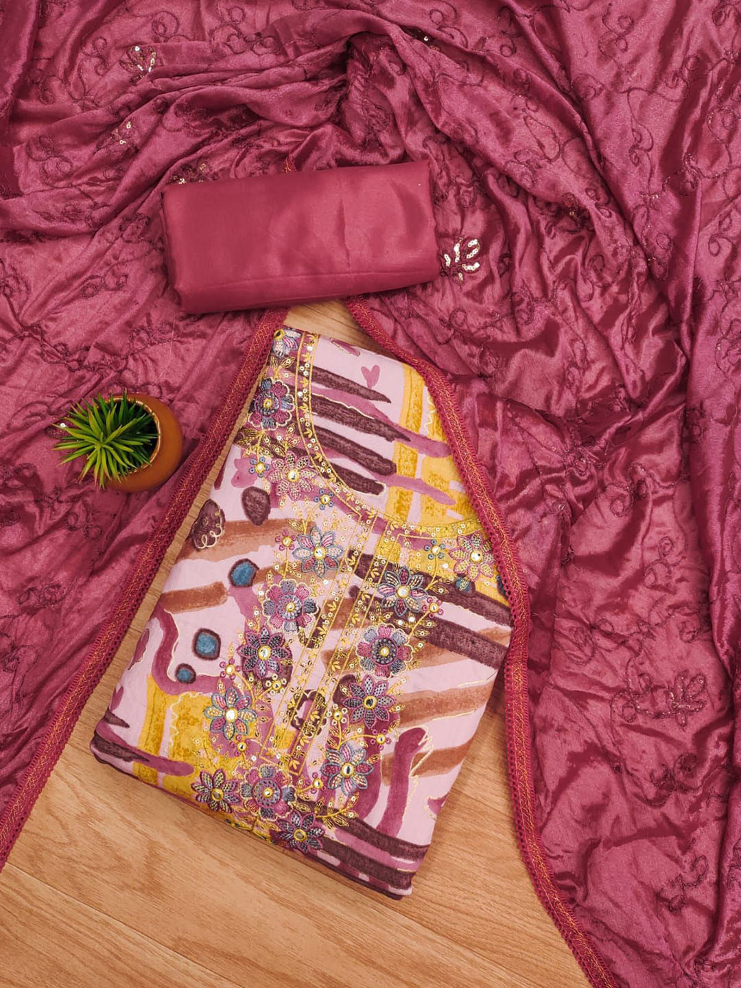 Rangtulika Ethnics Abstract Printed Sequinned Unstitched Dress Material