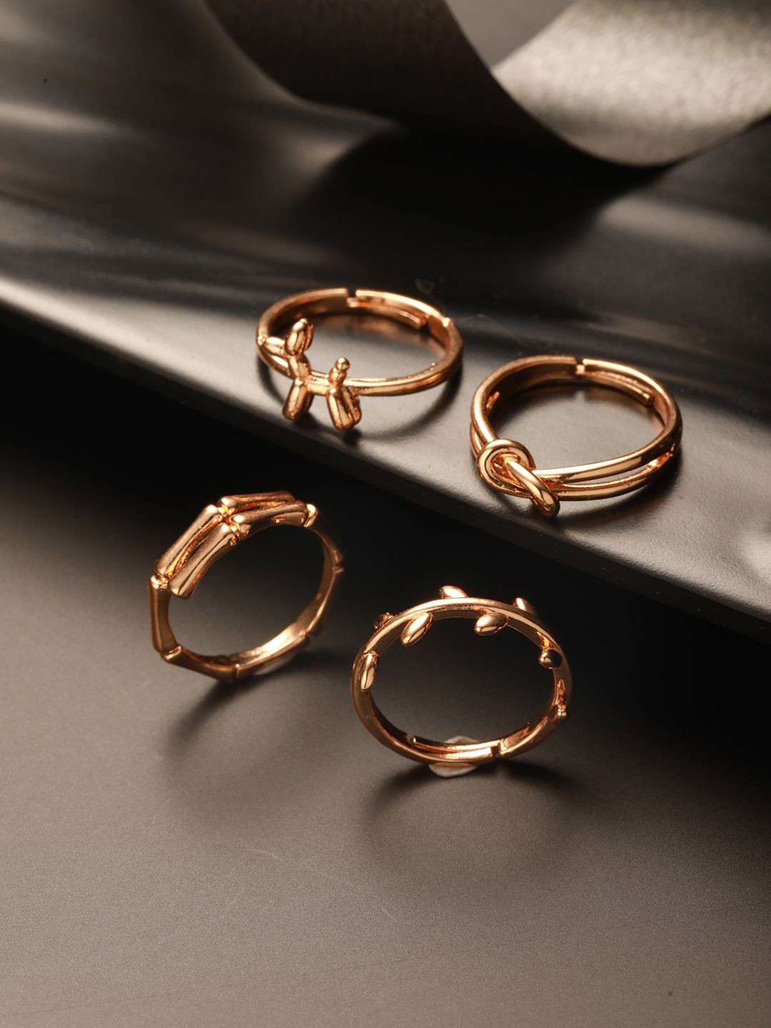 Jazz and Sizzle Gold-Plated Set Of 4 Stainless Steel Adjustable Finger Rings