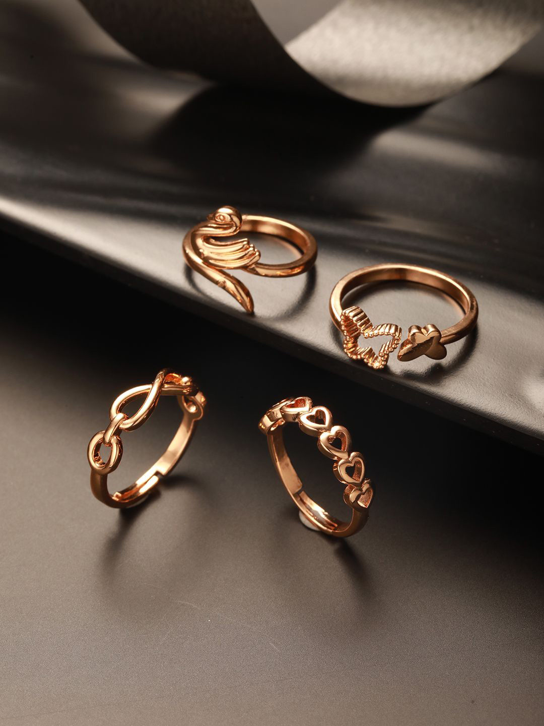 Jazz and Sizzle Set Of 4 Stainless Steel Gold-Plated Adjustable Finger Rings