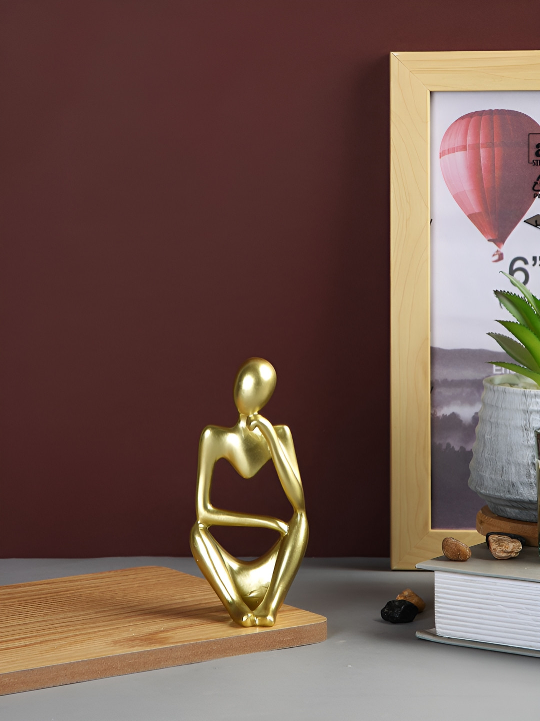 Myntra Elegant Homes Loving Embrace Gold Polyresin Natural Living Room Small Showpiece - 4.7 Inches