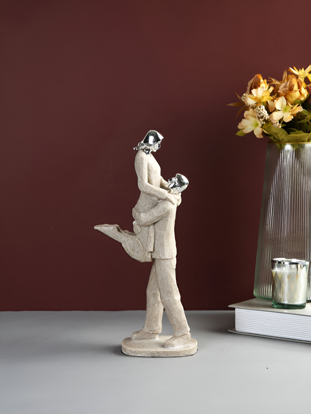 Myntra Elegant Homes Joyful Couple Beige Polyresin Natural Living Room Medium Showpiece - 10.6 Inches