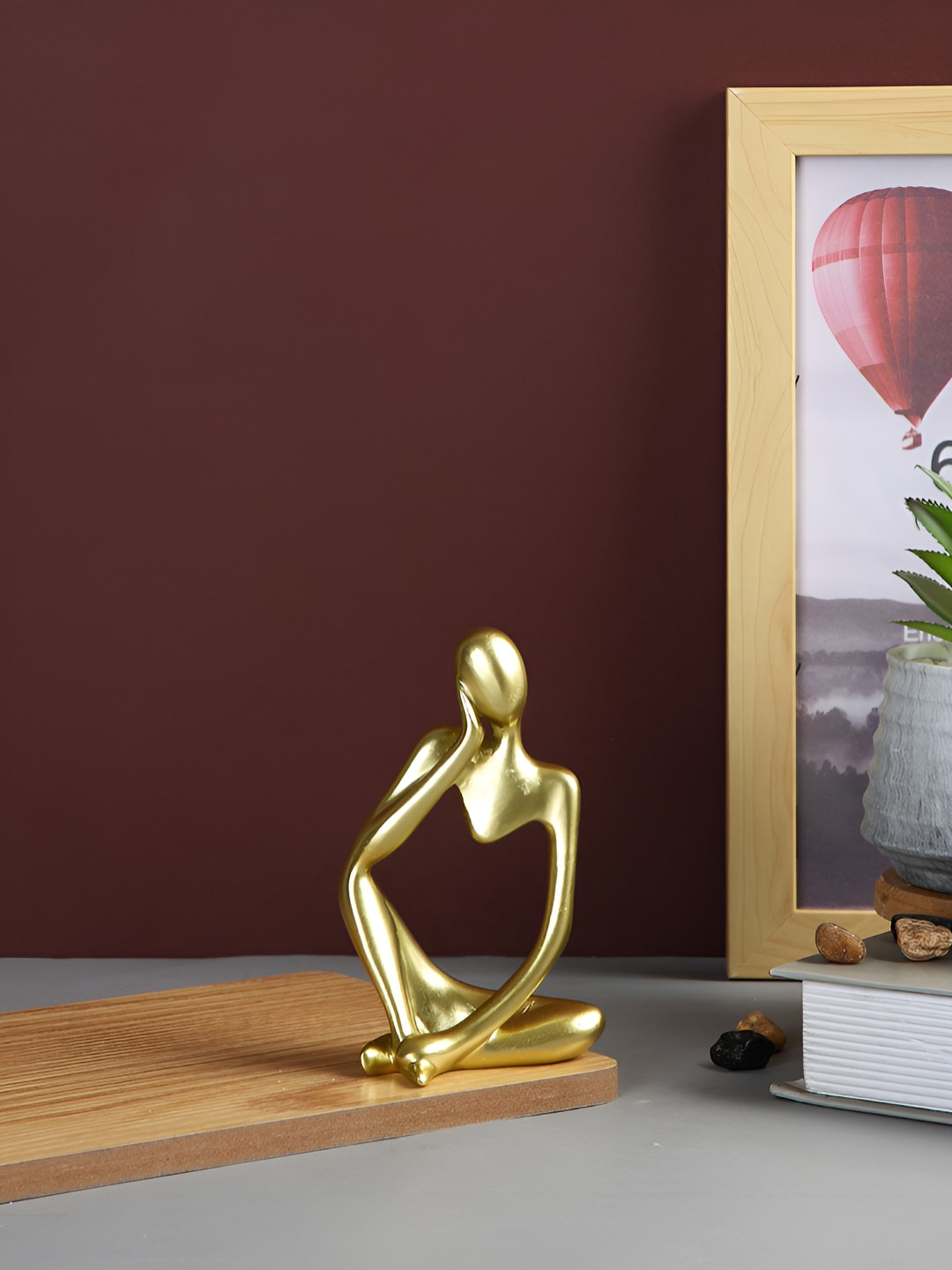 Myntra Elegant Homes Graceful Thinker Gold Polyresin Natural Living Room Small Showpiece - 4.9 Inches