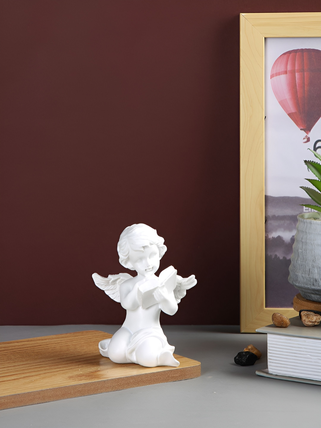 Myntra Elegant Homes Angelic Reader White Resin Glossy Living Room Small Showpiece - 4.3 Inches