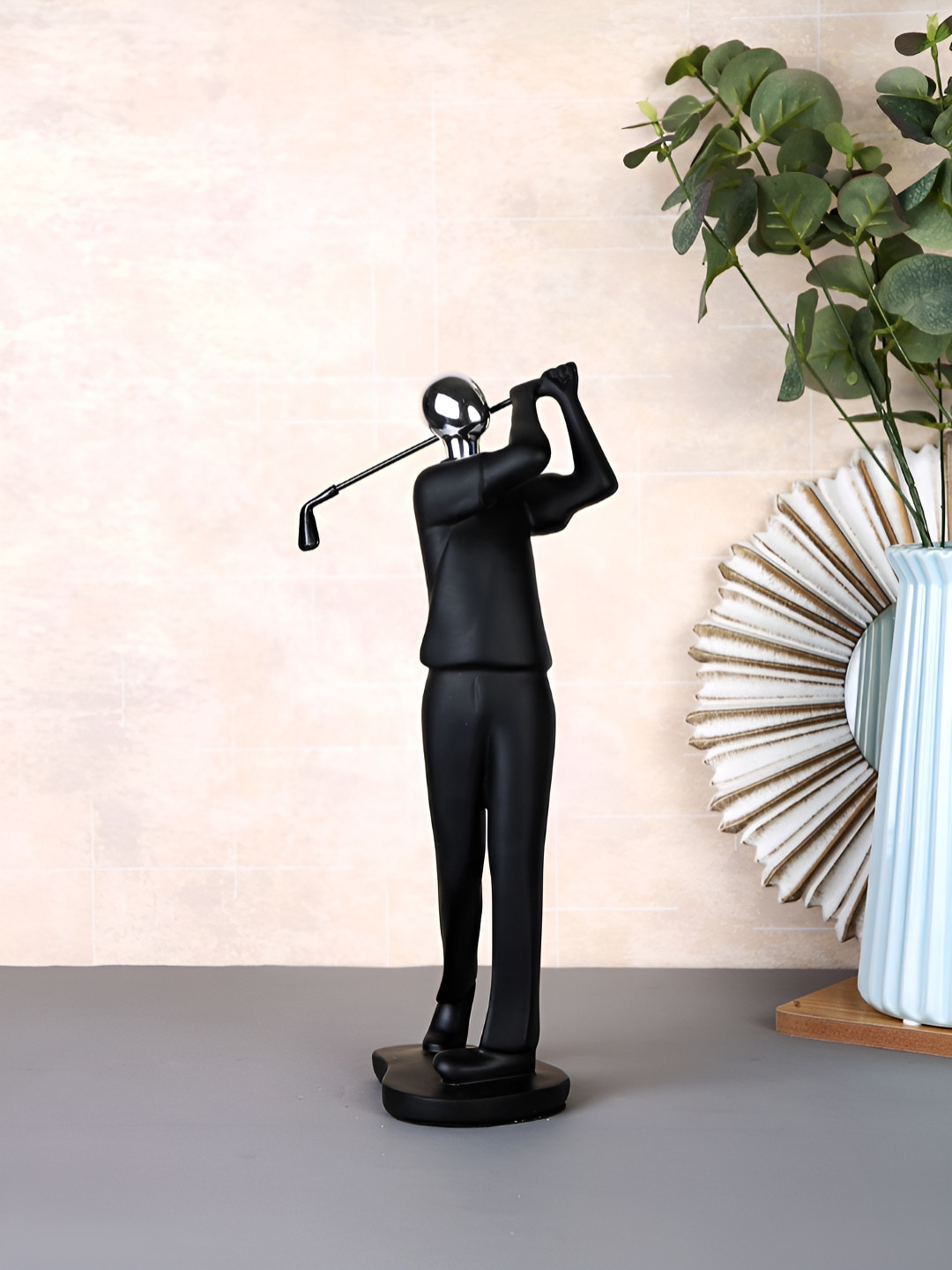 Myntra Elegant Homes Golf Player Black Polyresin Natural Living Room Medium Showpiece - 11.4 Inches