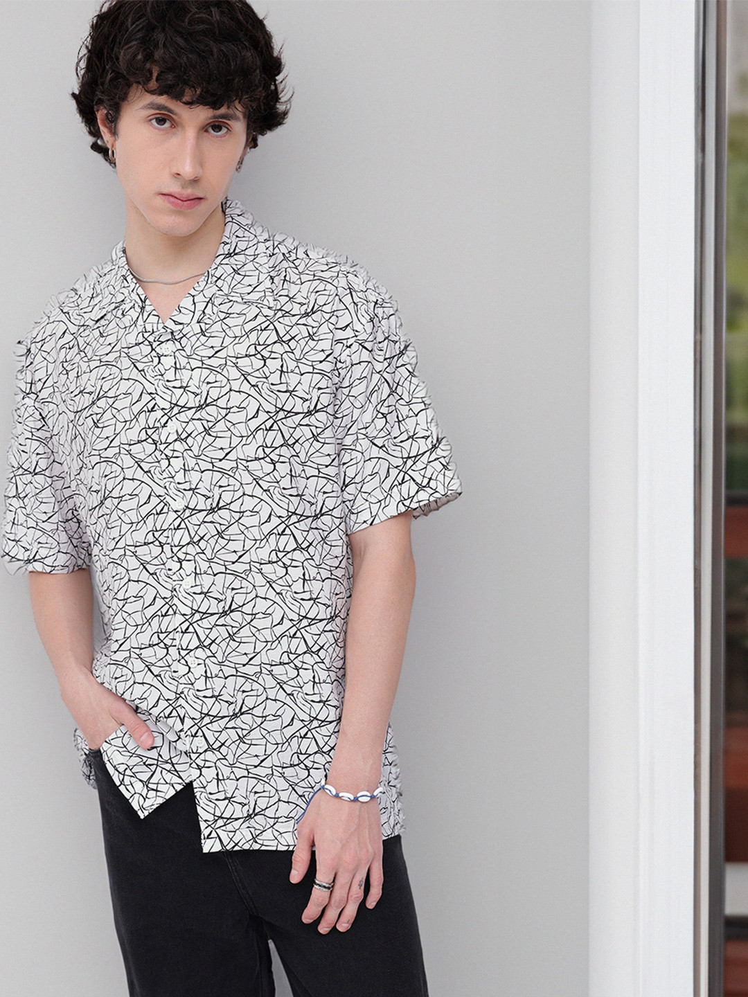 Kook N Keech Showcasing A Striking Print Shirt