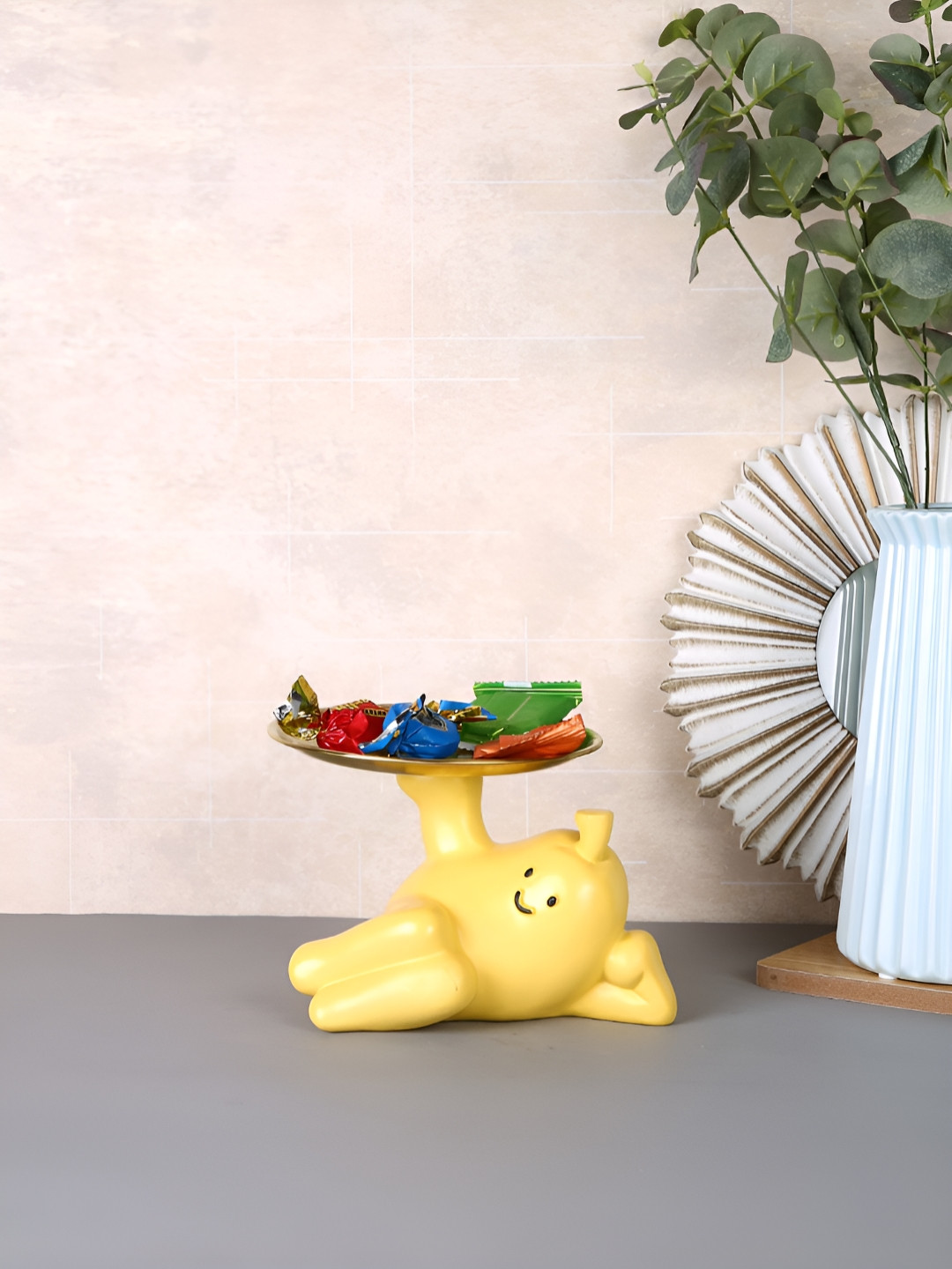Myntra Elegant Homes Playful Smily Gold Resin Matte Living Room Small Showpiece - 4.7 Inches