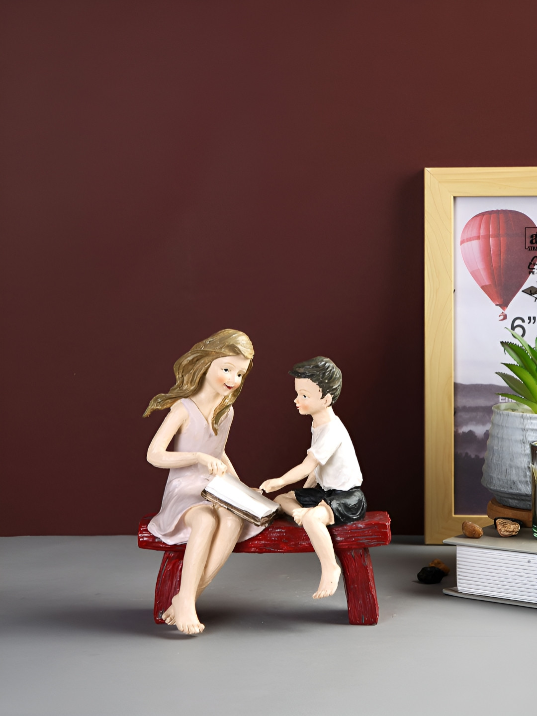 Myntra Elegant Homes Childhood Tales Pink Resin Matte Living Room Small Showpiece - 7.1 Inches