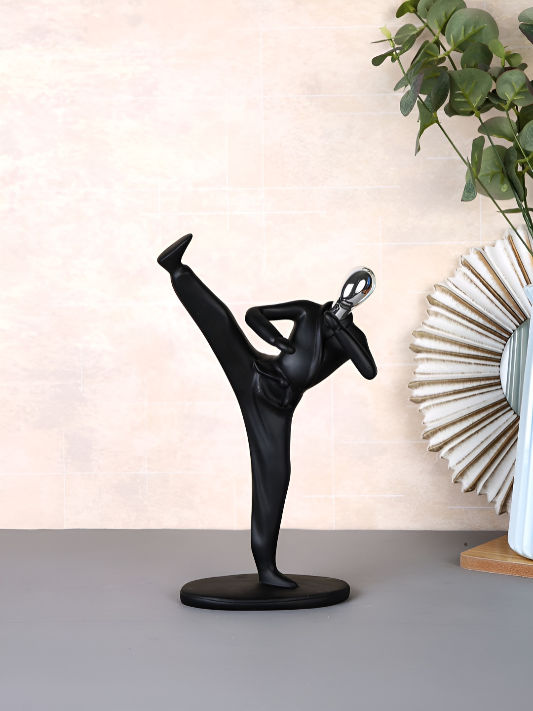 Myntra Elegant Homes Martial Arts Black Polyresin Natural Living Room Medium Showpiece - 9.8 Inches