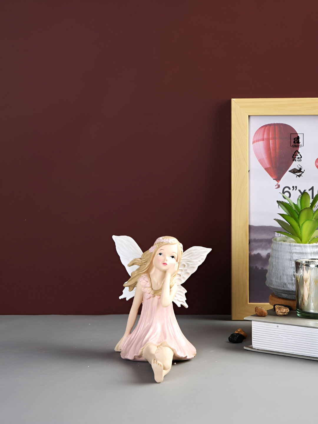 Myntra Elegant Homes Graceful Resting Fairy Pink Resin Matte Living Room Small Showpiece - 5.3 Inches