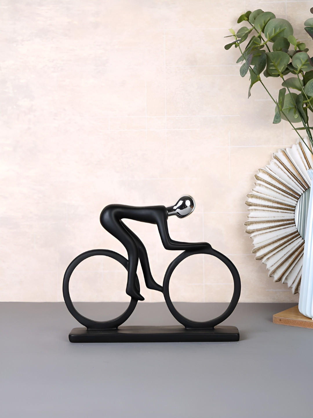 Myntra Elegant Homes Dynamic Cyclist Black Resin Matte Living Room Medium Showpiece - 6.7 Inches
