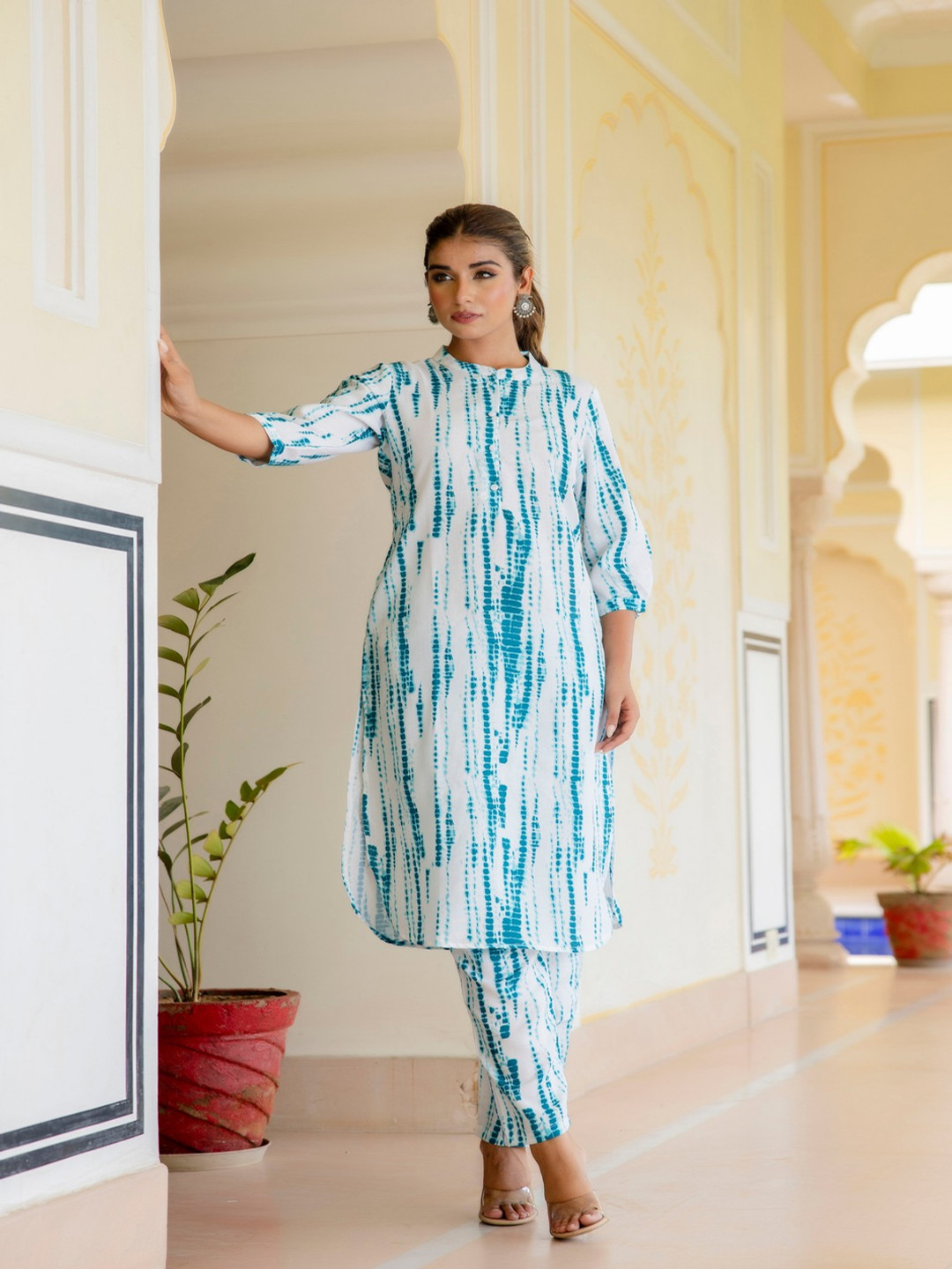 Lookmark Women Dyed Regular Kurta with Trousers