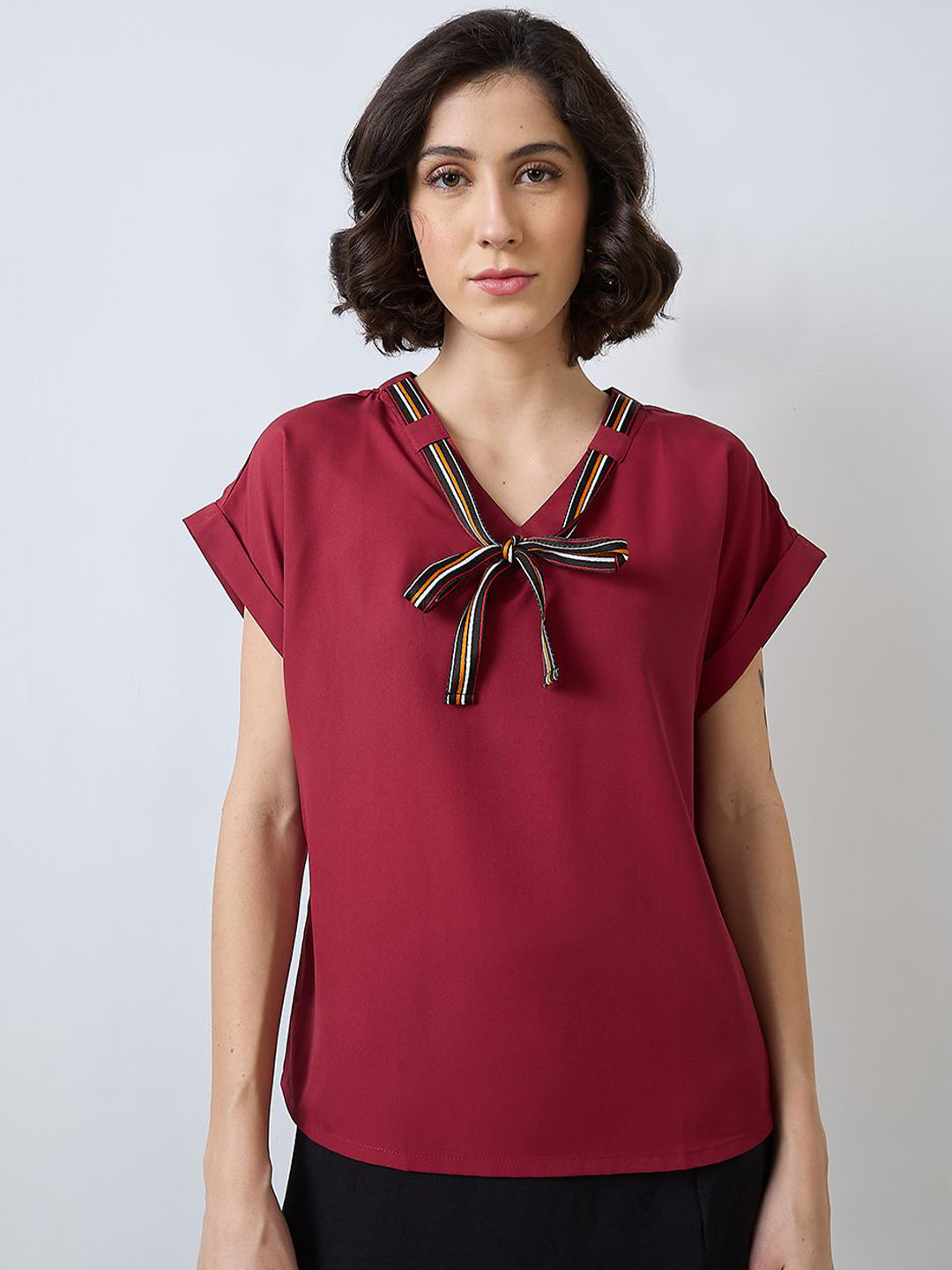 SZN Bow-Tie Extended Sleeves Top