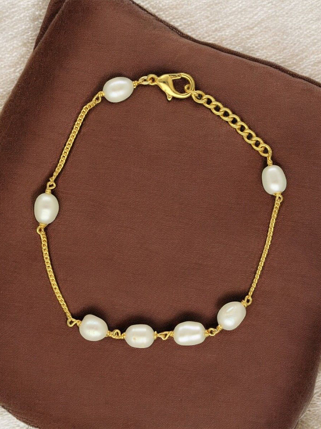 Sri Jagdamba Pearls Dealer Gold-Plated The Trinklet Charm Pearls Studded Bracelet