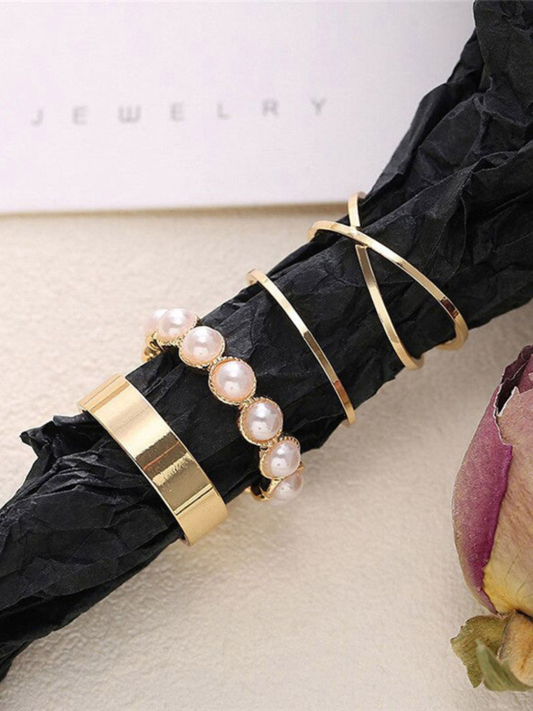 DressBerry Set Of 4 Gold-Plated Pearl Studded Adjustable Stackable Finger Rings