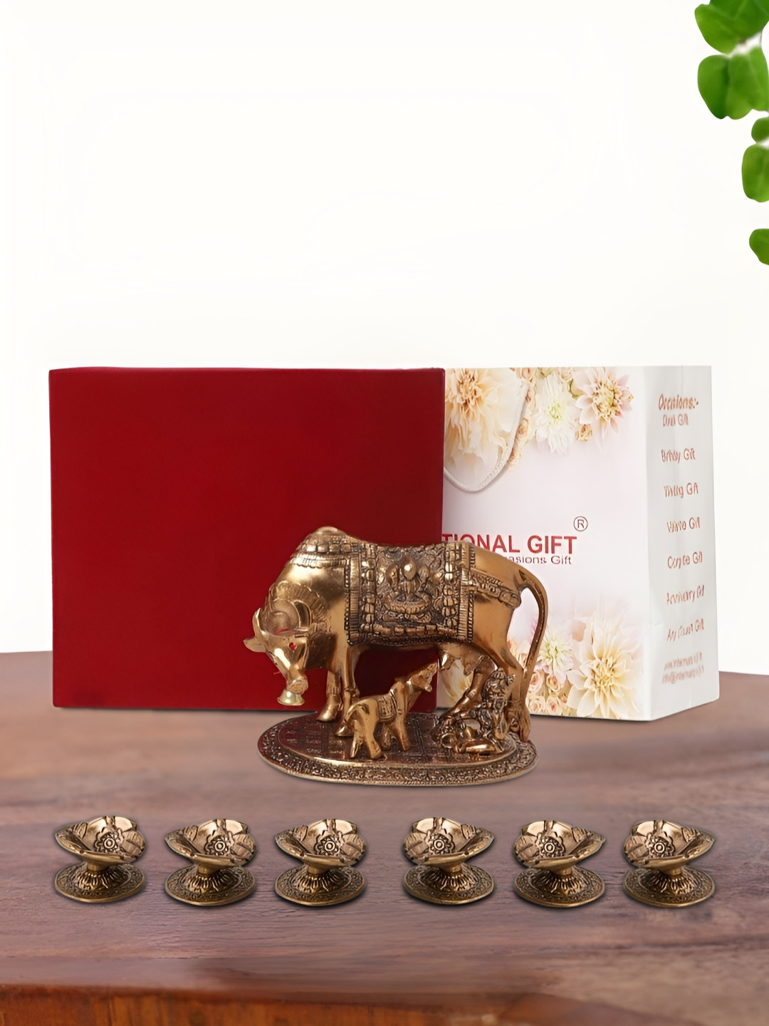 INTERNATIONAL GIFT Kamdhenu Cow with 6 Diya, Velvet Box and Carry Bag Copper Aluminium Metallic Living Room Tiny Showpiece - 2.6 Inches