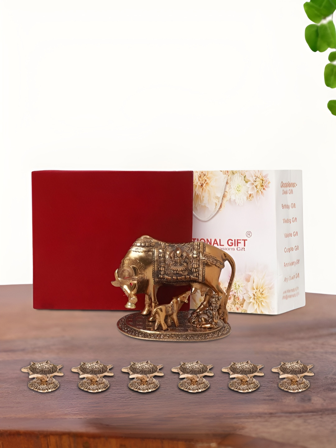 INTERNATIONAL GIFT Kamdhenu Cow with 6 Diya, Velvet Box and Carry Bag Copper Metal Metallic Prayer Room Medium Showpiece - 5.1 Inches