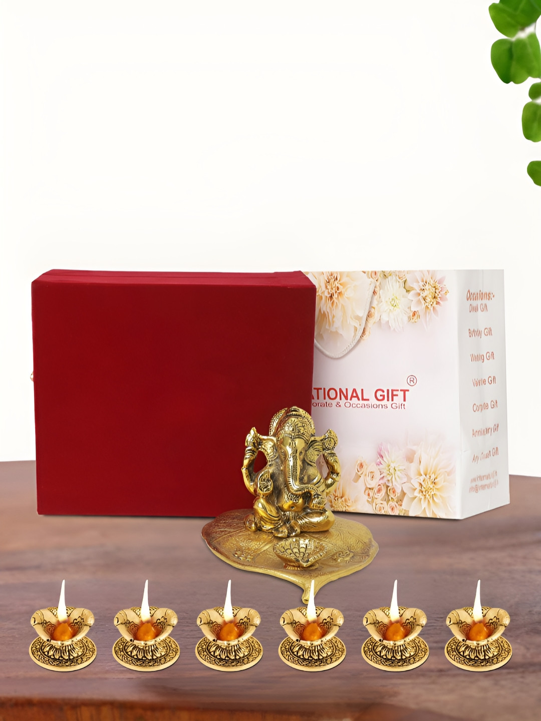 INTERNATIONAL GIFT Leaf Ganesh Idol with 6 Diya, Velvet Box and Carry Bag Gold Aluminium Metallic Prayer Room Small Showpiece - 4 Inches